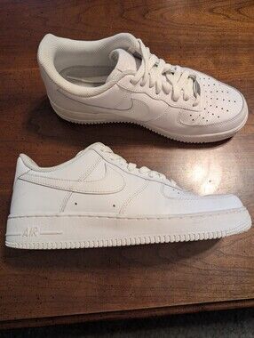 Nike Air Force 1 triple-white low-tops. Size 9.5